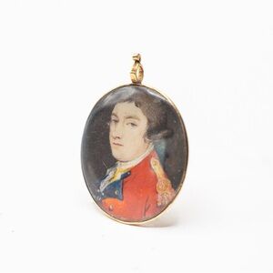 Antique miniature painting of an officer in a gold pendent